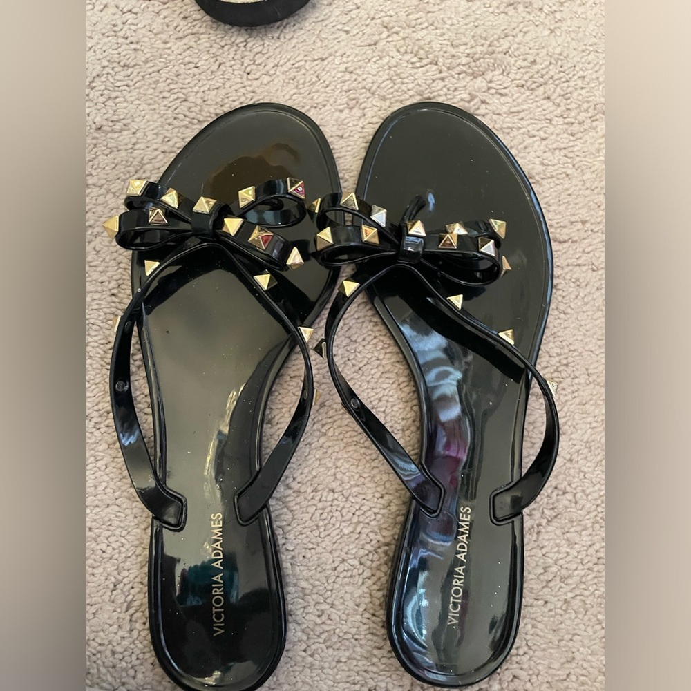 Victoria Adames bow with grommet sandals